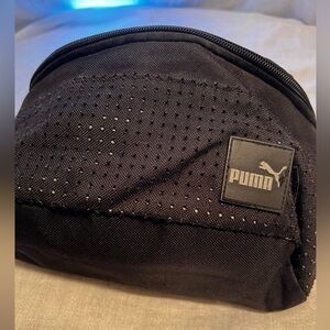 Puma fanny pack/crossbody. Black. One big pocket. Lots of room.